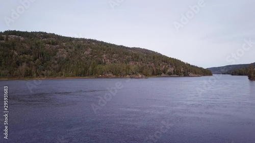 Aerial of Birkeland town near Tovdalselva river, Norway. DOLLY IN photo