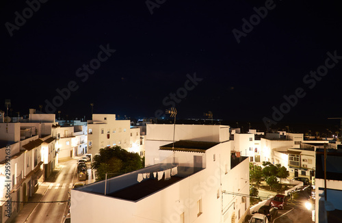 Las calles de Conil de la Frontera iluminadas por la noche, en la provincia de Cádiz. Andalucía. España
