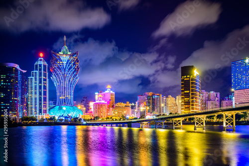 Macau cityscape at night, all hotel and tower are colorful lighten up with blue sky, Macau, China. photo