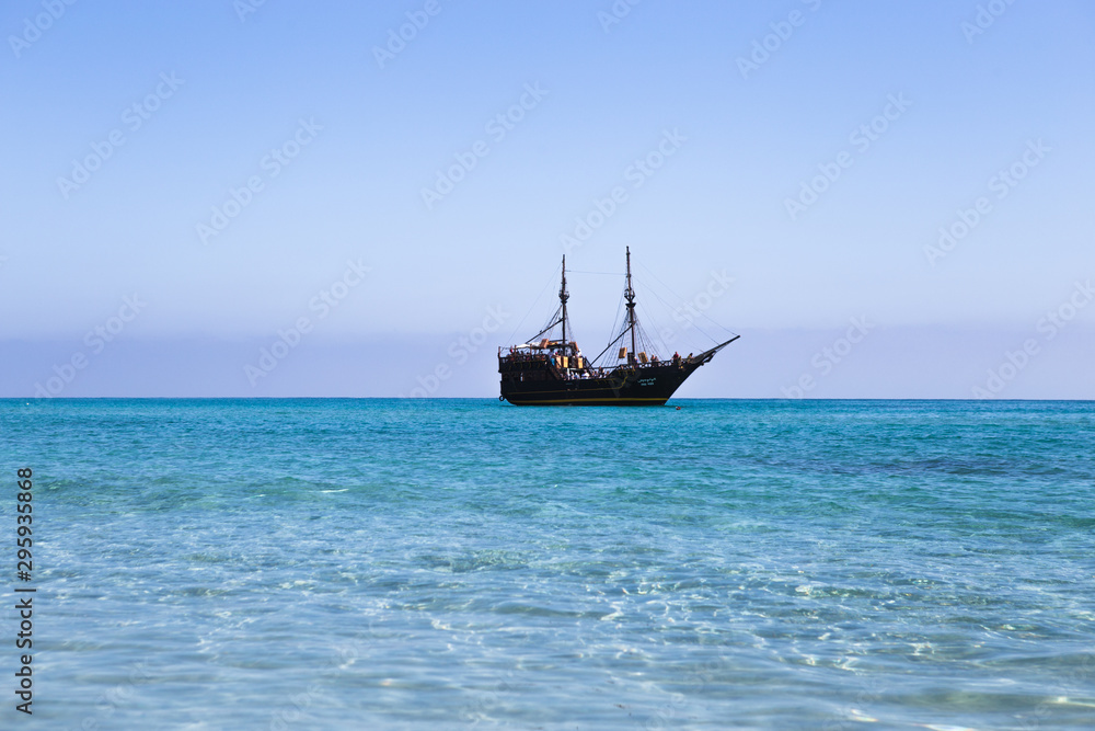 Tunis, Tunisia 28 September 2019 - A modern day pirate ship that doubles as a party boat sits off the coast of tunisia Tunis, Tunisia 28 September 2019 - A modern day pirate ship that doubles as a party boat sits off the coast of tunisia