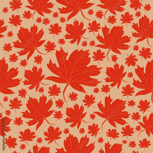 Pattern autumn leaves of orange maple on a cream background