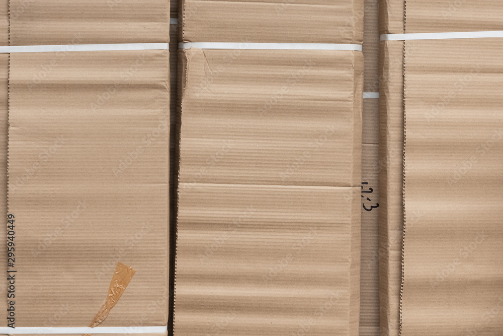 Crafted cardboard box background with vertical lines