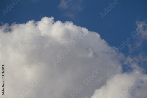 Big white cloud in the blue sky, copyspace