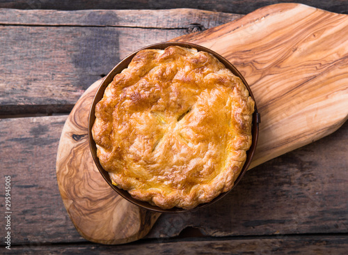 Photos Individual chicken pot pie with puff pastry crust. top view