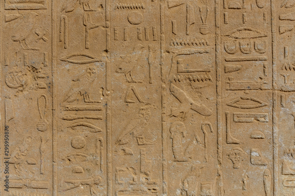 Egyptian ancient hieroglyphs on the stone wall