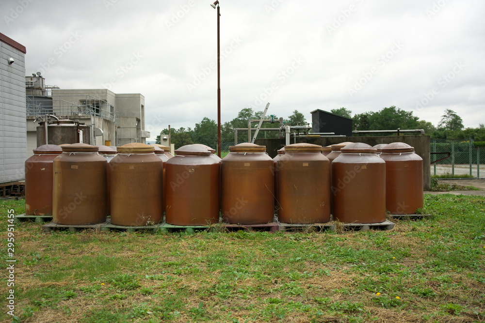 Φωτογραφία Akita,Japan-October 4, 2019: Big clay crocks or vases or jugs for aging or maturing Shochu, a popular distilled spirit made from rice or potato in japan