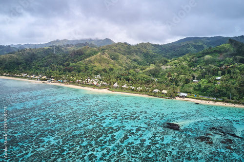 Kayaking on pristine blue water in Fiji from a 5 star resort drone aerial