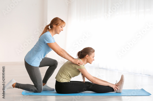 Mother and daughter training at home