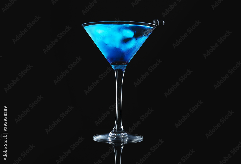 Glass of tasty cocktail on dark background Glass of tasty cocktail on dark background