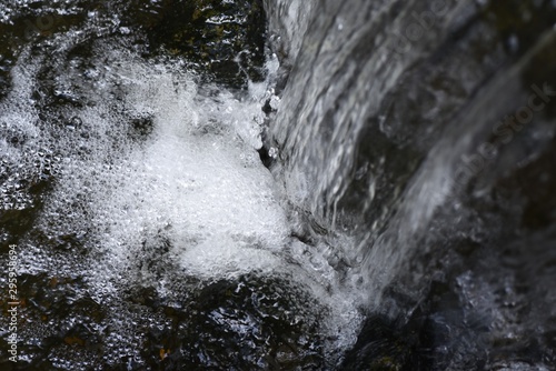 A small waterfall in a Japanese style garden