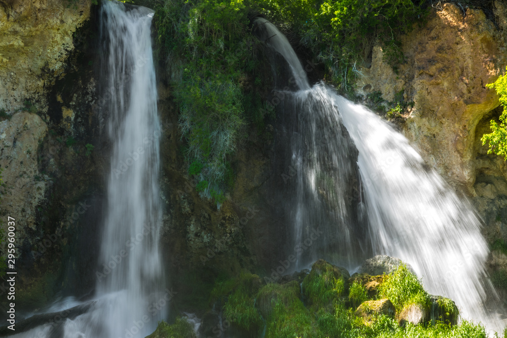 Two of the three waterfalls of Rifle Falls State Park in Rifle, Colorado.