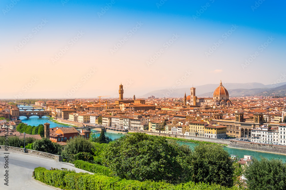 Florence, Italy: scenic view on famous italian town with Duomo and Arno river at sunset