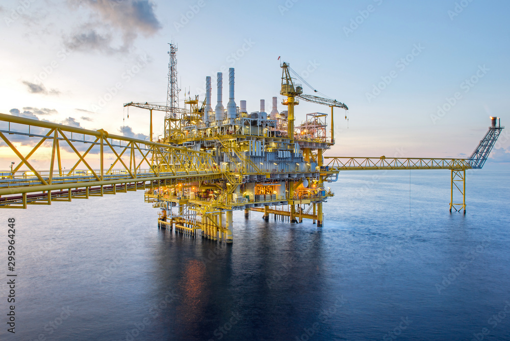 Offshore oil and gas rig platform with beautiful sky in the gulf of Thailand. Offshore oil and gas rig platform with beautiful sky in the gulf of Thailand.
