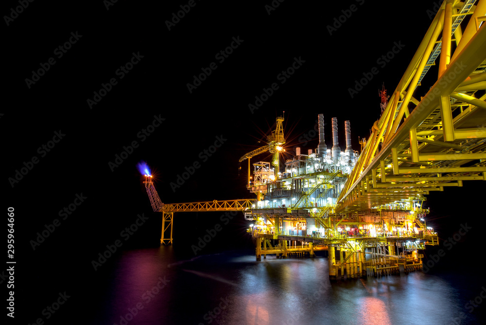 Industrial Offshore oil and gas,Oil rig platform with milky way at night