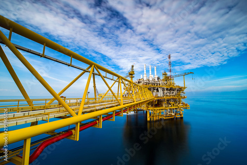 Offshore oil and gas rig platform with beautiful sky in the gulf of Thailand.