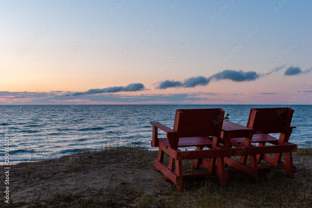 two chairs on the beach over looking Lake Superior in Michigan's Upper Peninsula