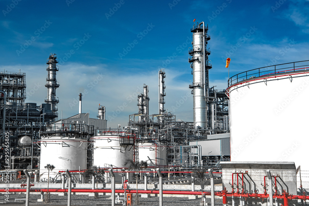 Oil and gas refinery storage tank and Detail of equipment oil pipeline steel with valve for industrail petroleum. Oil and gas refinery storage tank and Detail of equipment oil pipeline steel with valve for industrail petroleum.