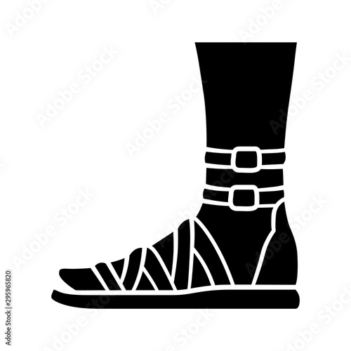 Gladiator sandals glyph icon. Woman stylish footwear design. Female casual shoes, modern summer flats with ankle strap side view. Silhouette symbol. Negative space. Vector isolated illustration