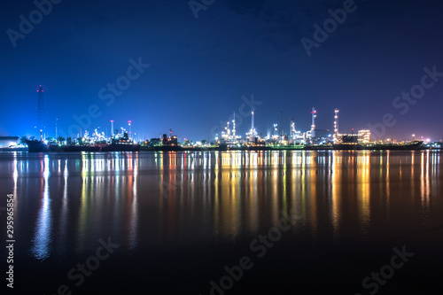 Panorama wide-angle Large oil and gas refinery industrial area at night © JT Jeeraphun
