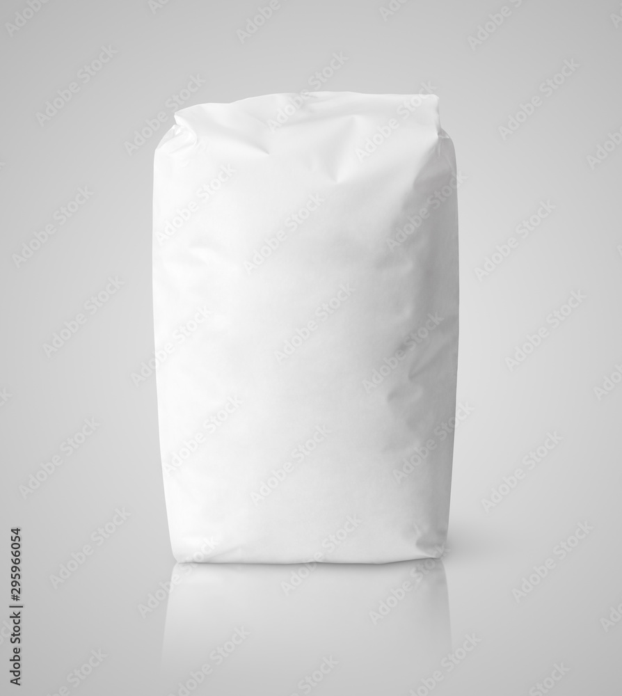 Blank white paper bag package on gray background with clipping path Blank white paper bag package on gray background with clipping path
