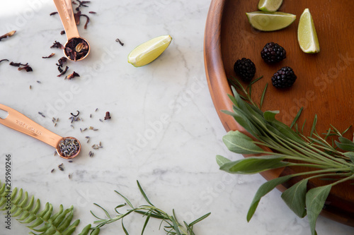 Greenery herbs on marble background 