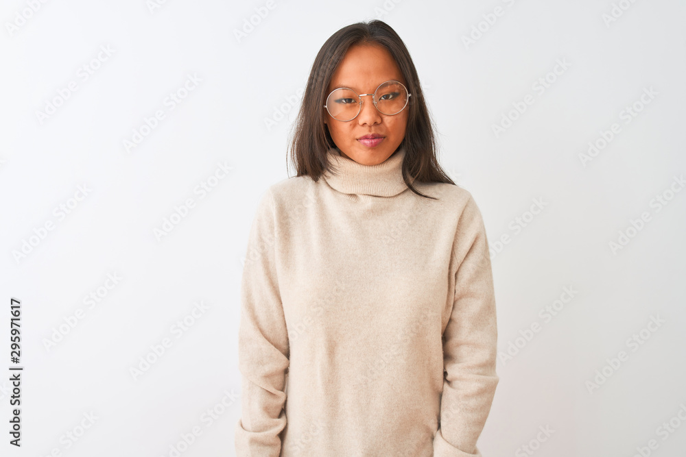 Young chinese woman wearing turtleneck sweater and glasses over isolated white background skeptic and nervous, frowning upset because of problem. Negative person. Young chinese woman wearing turtleneck sweater and glasses over isolated white background skeptic and nervous, frowning upset because of problem. Negative person.