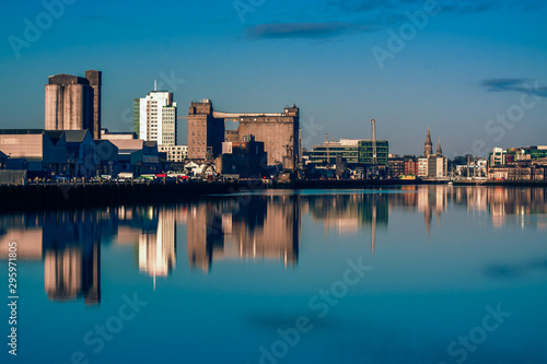 Cork Ireland city center harbor panorama view morning sunrise cold weather calm river water reflection buildings colors  © Cristi