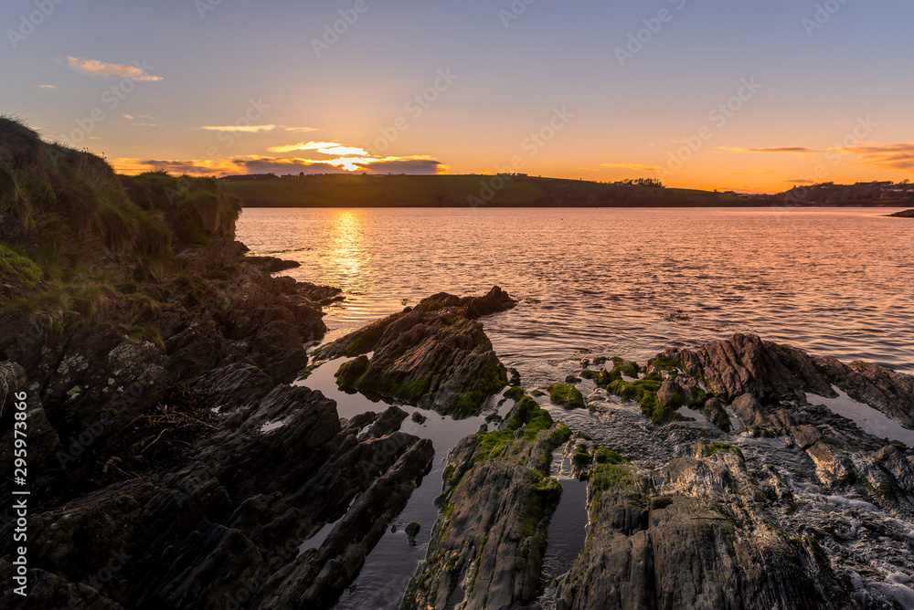 Fototapeta premium Beautiful view sunset rocks bay Atlantic Way Charles Fort Kinsale Cork Ireland