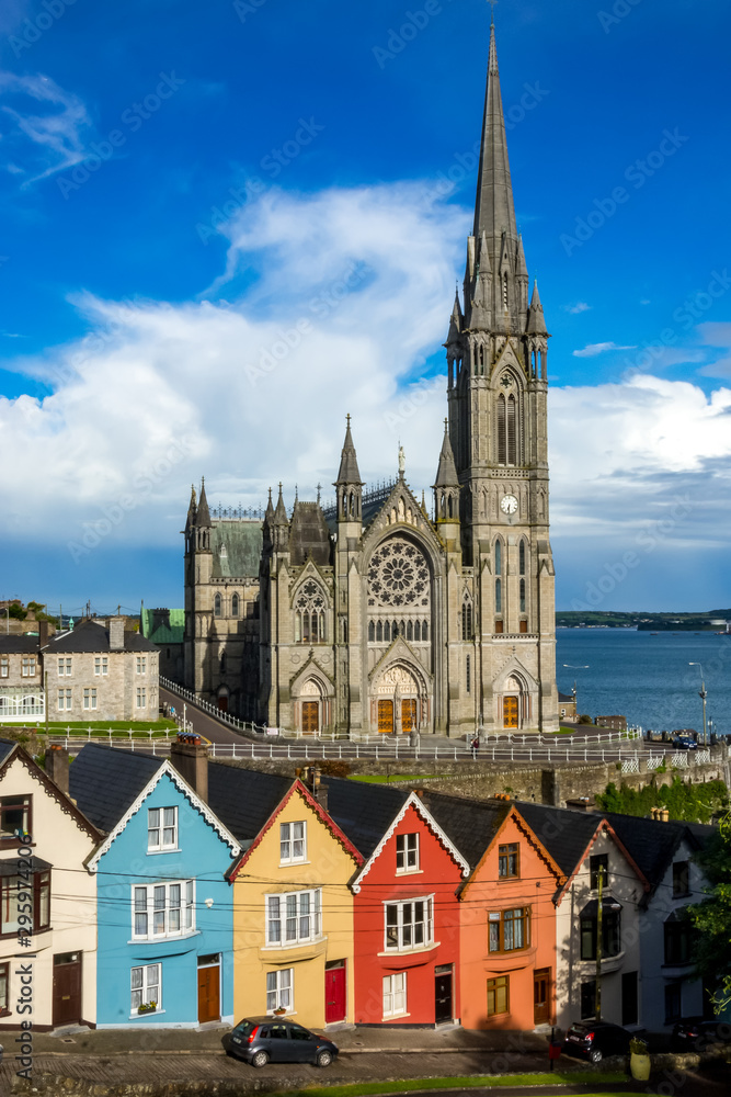 Cobh Cathedral colored houses Landscape clear sky