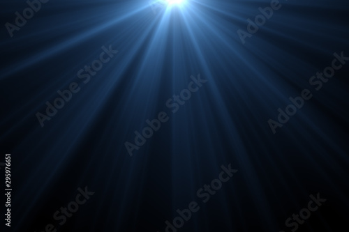 Blue rays light on back background.