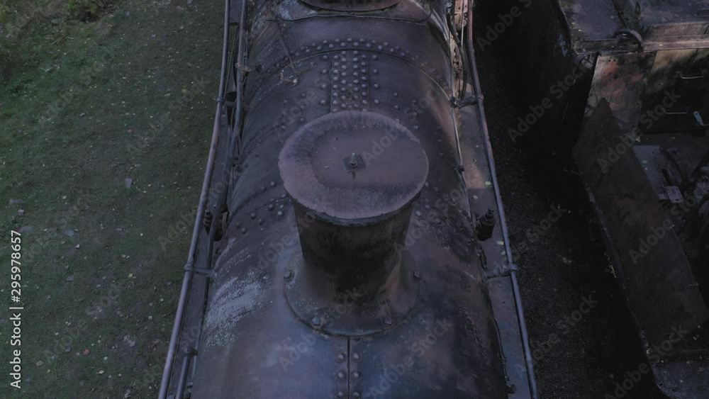 Cinematic aerial tilt parallax over abandoned steam train 4K Cinematic aerial tilt parallax over abandoned steam train 4K