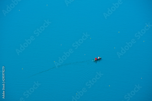 Two mans kayaking on the lake