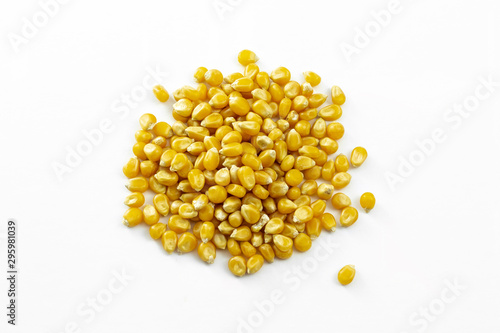a group of dried corn kernels on white background