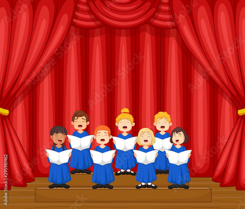 Choir children singing a song on the stage