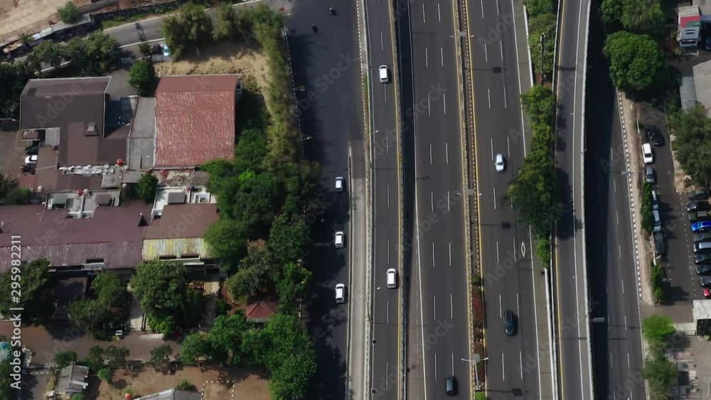 Top Down Aerial View of Tomang Inter-serction in Jakarta city. Fast Moving car. slider Movement Top Down Aerial View of Tomang Inter-serction in Jakarta city. Fast Moving car. slider Movement