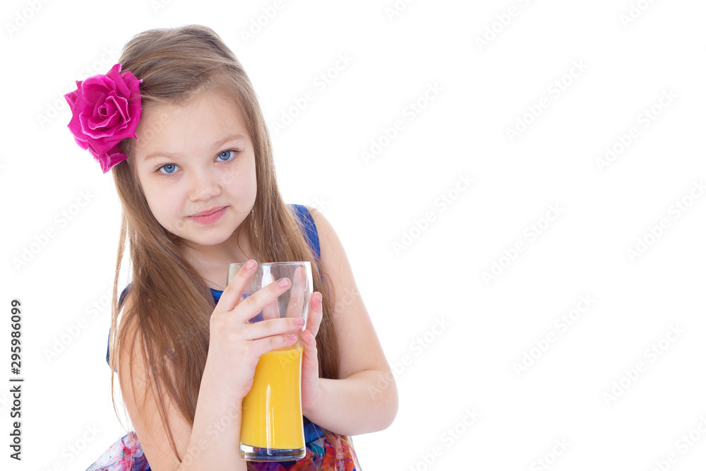 Portrait of happy little girl drinking orange juice Portrait of happy little girl drinking orange juice