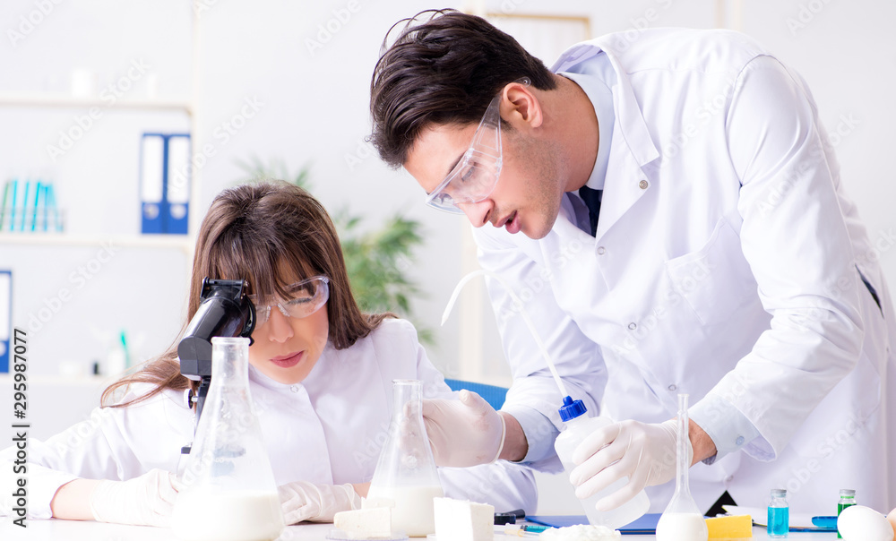 Two lab doctor testing food products Two lab doctor testing food products