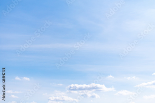 Blue sky background with white clouds. Clearly nice sky on blue.