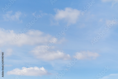 Blue sky background with white clouds. Clearly nice sky on blue.