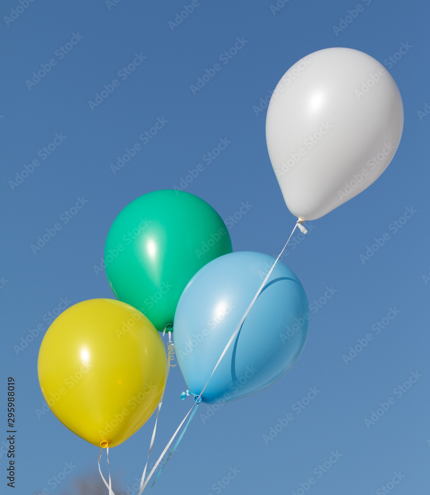 rubber balloons on a background of blue sky rubber balloons on a background of blue sky