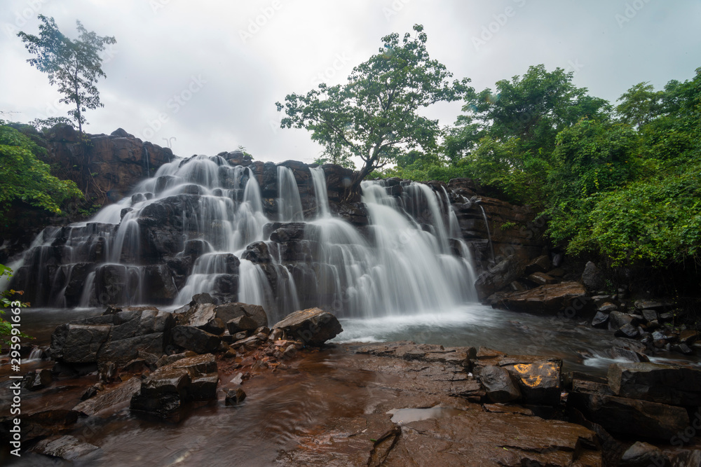 Fototapeta premium Beautiful Savdav Waterfall seen during Monsoon months near Kankavli,Sindhudurga,Maharashtra,India