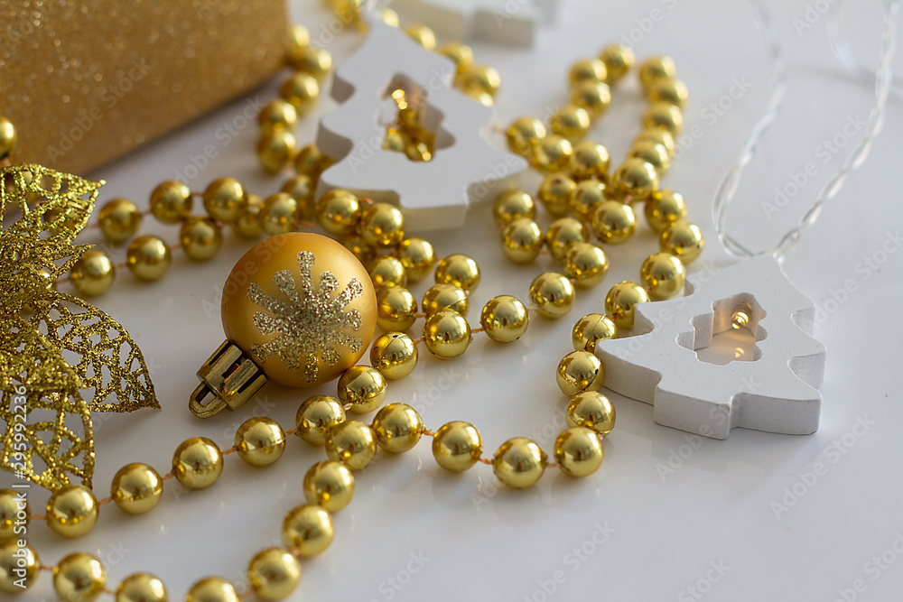 Christmas ball, Christmas white garland and beads on a white background Christmas ball, Christmas white garland and beads on a white background