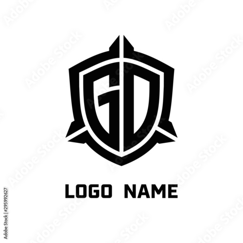 initial GD letter with shield style logo template vector. shield shape black monogram logo