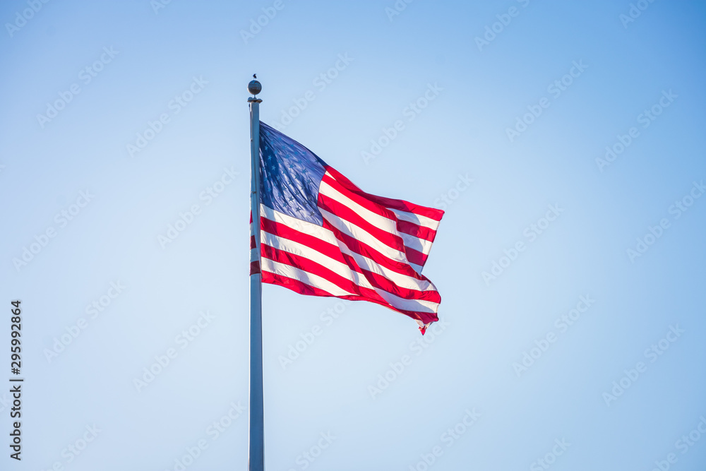 American flag on pole flowing in the wind