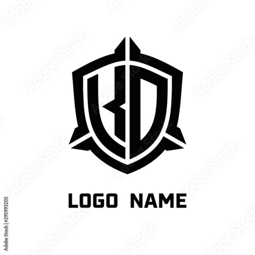 initial KO letter with shield style logo template vector. shield shape black monogram logo