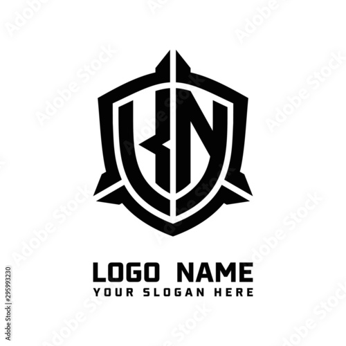 initial KN letter with shield style logo template vector. shield shape black monogram logo