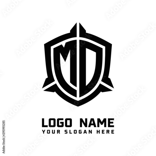 initial MD letter with shield style logo template vector. shield shape black monogram logo