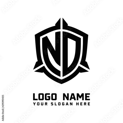 initial ND letter with shield style logo template vector. shield shape black monogram logo