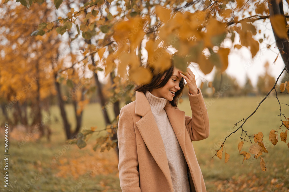 Beautiful lady surrounded autumn leaves Beautiful lady surrounded autumn leaves