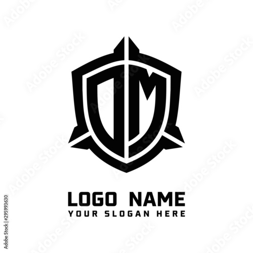 initial OM letter with shield style logo template vector. shield shape black monogram logo
